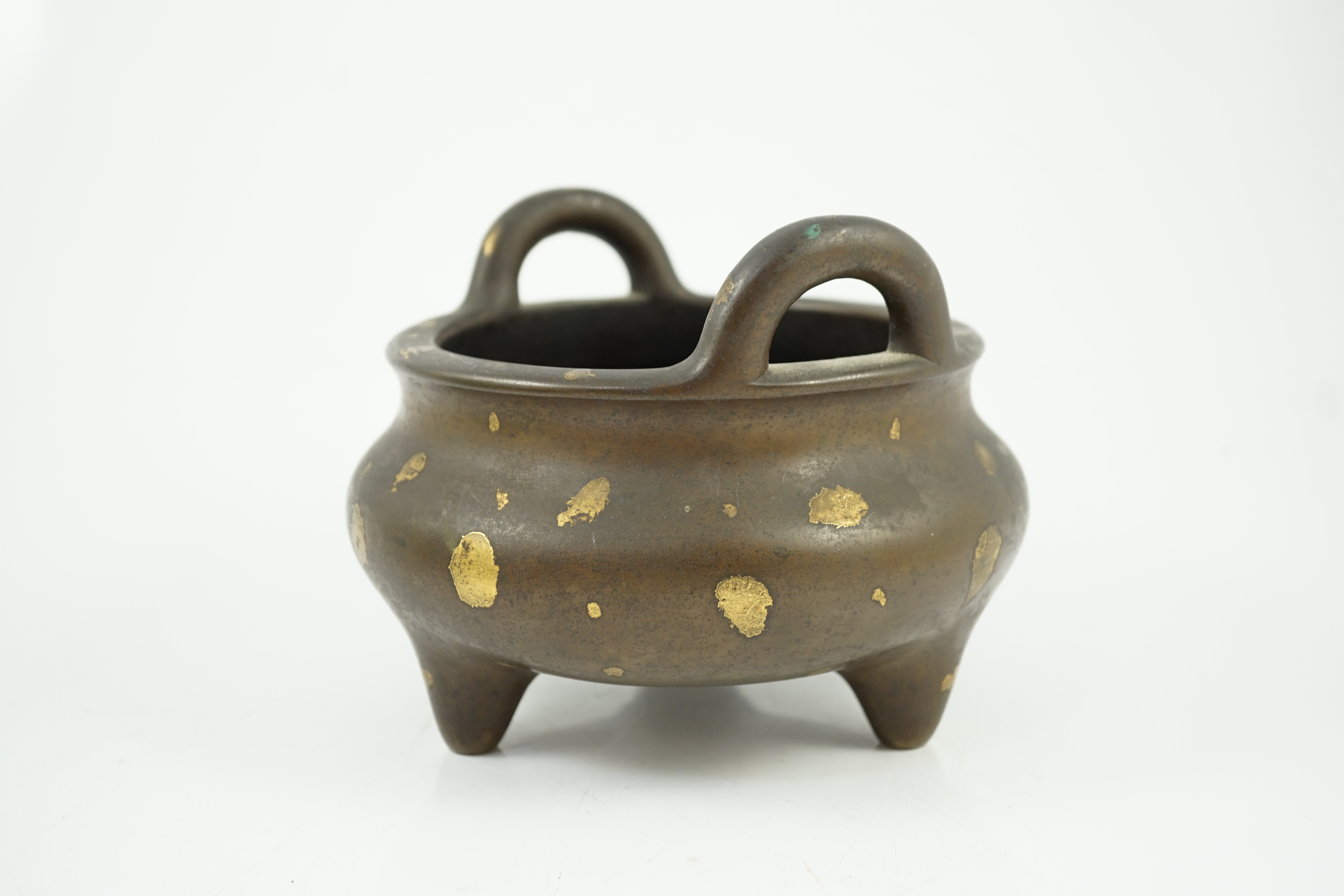 A large Chinese gold-splashed bronze tripod censer, ding, Kangxi period